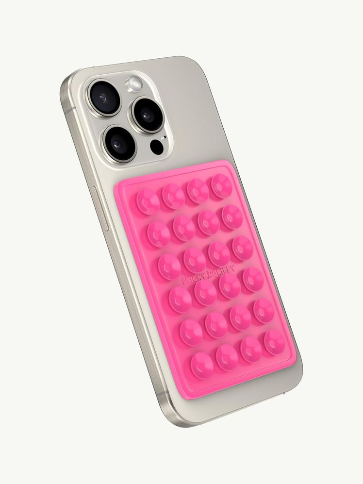 Image may contain: Electronics, Mobile Phone, Phone, Remote Control, Medication, and Pill