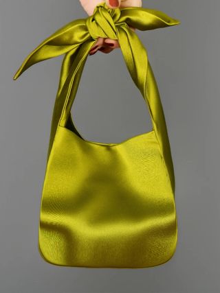 Image may contain Accessories Bag Handbag Purse Formal Wear and Tie