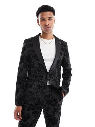 Image may contain Blazer Clothing Coat Formal Wear Jacket Suit Tuxedo Adult Person Accessories and Jewelry