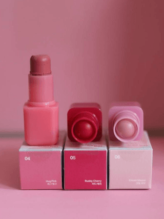 Image may contain Cosmetics Lipstick Box Tape Nail Polish Medication and Pill